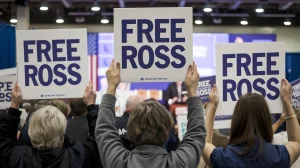 AI image of Libertarian campaigners holding placards stating 'Free Ross' / Donald Trump has renewed his vow to liberate the besieged Silk Road founder, Ross Ulbricht, who commenced his 12th year in prison on October 1. 